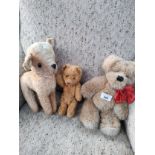 Three antique and vintage teddies to include straw filled lamb, Mohair bear with movable limbs and