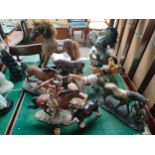 A Collection of horse figures to include small rocking horse, jockey rider etc