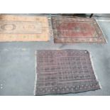 3 eastern themed rugs