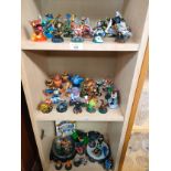 3 Shelf of Skylanders figures .