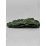 Antique Chinese spinach green hand carved sculpture of a bat. [9cm in length]