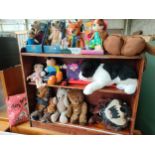 A Collection of collectable soft toys includes furby, meerkat's boxed teddies etc