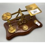 A Set of antique letter scales, comes with brass weights.