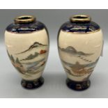 A Pair of miniature Japanese satsuma hand painted panelled vases. Signed to the base. [9cm high]