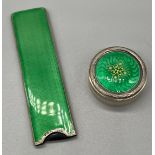 London Import silver and green enamel comb holder together with a foreign silver and green enamel
