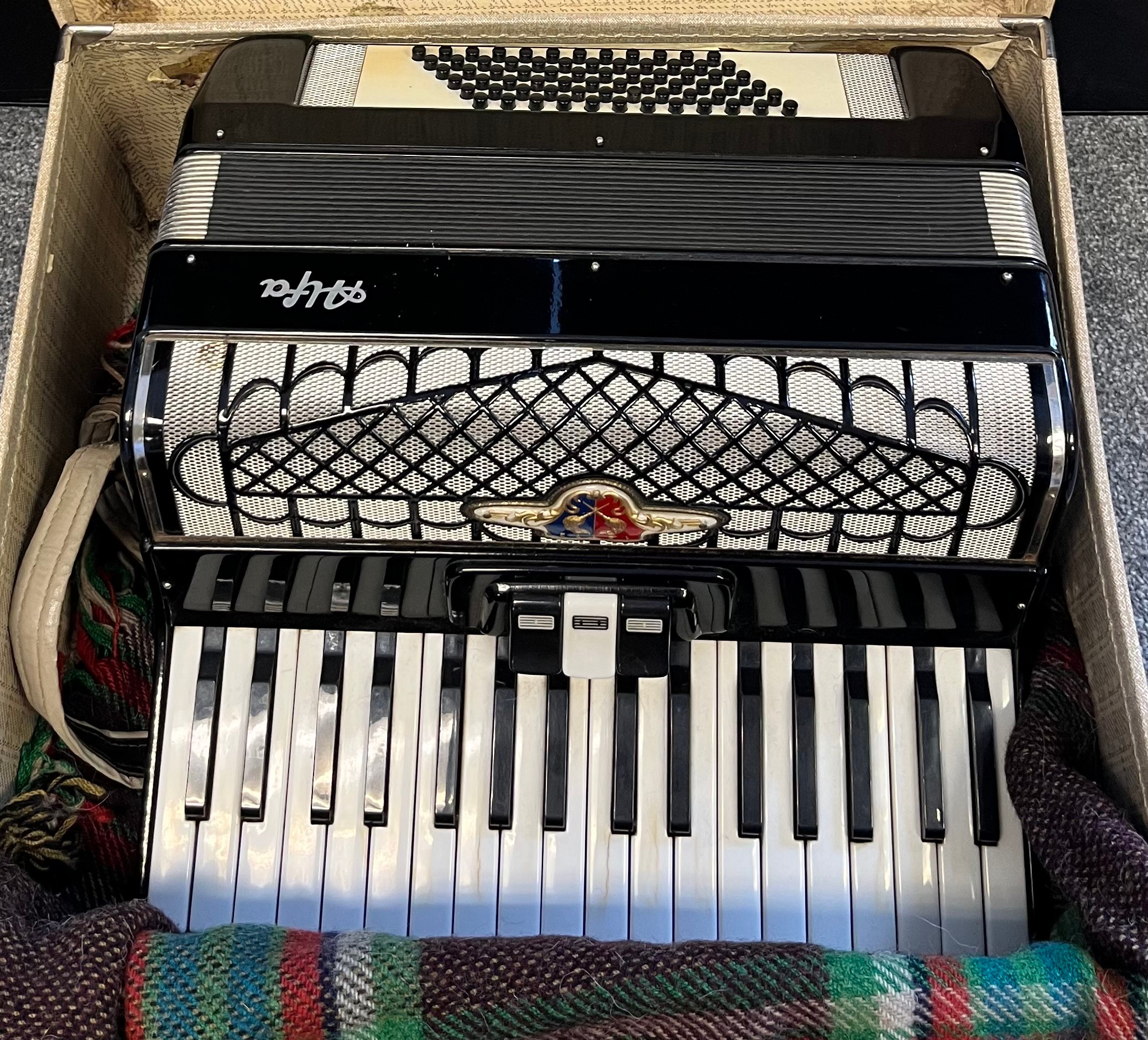 A vintage cased Alfa Accordion