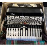 A vintage cased Alfa Accordion