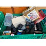 A Large box of various camera equipment to include scuba pro cyber shot camera, canon lense,