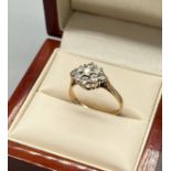 9ct yellow gold ladies ring set with a cluster of clear glass stones. [Ring size M] [2.05Grams]