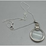 925 silver owl shaped magnifying glass pendant with silver necklace.
