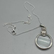 925 silver owl shaped magnifying glass pendant with silver necklace.