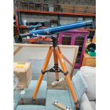 Telescope on tripod stand