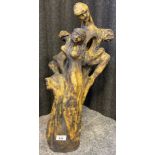 A Large studio pottery sculpture showing various figures. [Signature indistinctive] [56cm high]