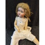 Large Antique German Bisque head doll. A.11.M. Plaster hands and feet. Movable joints. [69cm in