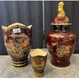 Two Carlton ware Rouge Royale Pagoda scene vases and large temple jar with foo dog lid [42cm high]