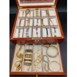 A Large jewellery bracelet display box full of gate bracelets, id bracelets etc