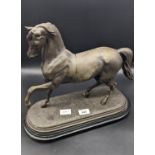 Antique Spelter horse sculpture sat upon a wooden plinth. [Damage to legs- see image] [36cm high]