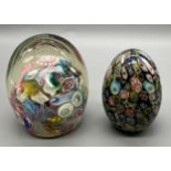 Two antique/ vintage paperweights- Egg shaped millefiori paperweight. Italian made dump style cane