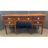 19th century Georgian style, Mahogany serpentine front sideboard- fitted with brass round handles.
