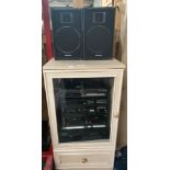 A Selection of Technics Hifi separates with speakers and cabinet