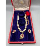 Antique/ Vintage Indian gold pendant fitted with a large ruby stone off set by pearls and green