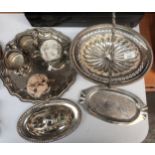 Selection of silver plated wares include swing handled basket, cruet set etc