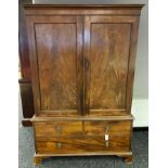 Georgian two door linen press converted to a wardrobe, the moulded cornice above two doors, two