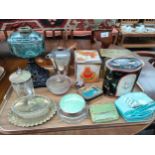 A Tray of collectables includes Victorian oil lamp base, vintage tins etc