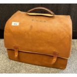 Antique brown leather doctors travel bag, comes with a cloth exterior protective casing