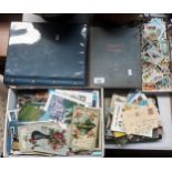 A Large collection of old postcards, cigarette tea cards, cigarette picture card album etc