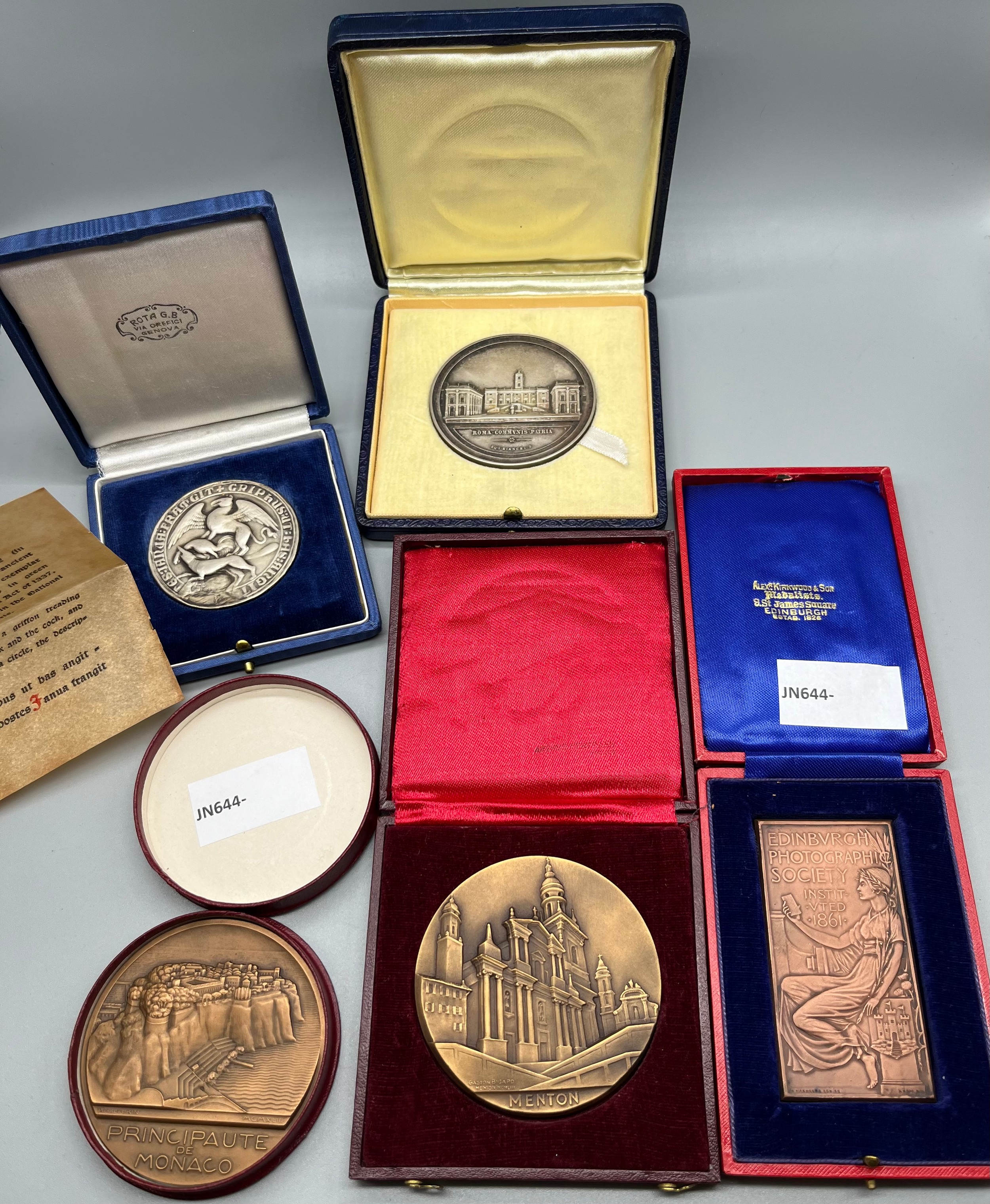 A Collection of Bronze and silver coin medallions with presentation boxes. Includes Edinburgh