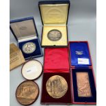 A Collection of Bronze and silver coin medallions with presentation boxes. Includes Edinburgh