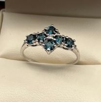 10ct white gold ladies ring set with 6 blue stones. [Ring size P] [1.81Grams]