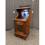 Mahogany side cabinet, the top with shelf above a mirrored back and cupboard opening to interior