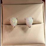 A Pair of 925 silver and pear shaped opal stud earrings.