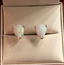 A Pair of 925 silver and pear shaped opal stud earrings.