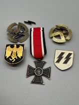 A Selection of reproduction Military German badges.