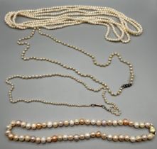 A Lot of four Antique/ Vintage pearl necklaces. One large set, One set with a 9ct gold bean style