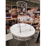 Vintage garden table along with cast metal chair