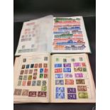 2 Large albums of world stamps includes a large selection of Great Britain stamps includes