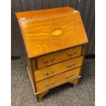 19th century bureau, the slant front with shell marquetry design, opening to an interior with fitted