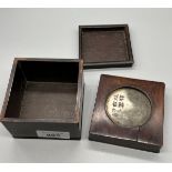 Antique Chinese wooden box fitted with a Jade disc to the lid. [7.5x8.5x8.5cm]