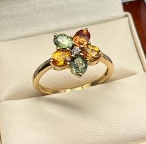 10ct yellow gold ladies ring set with various gem stones set in a flower design. [Ring size P 1/