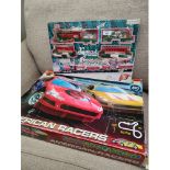American racers micro scalextrics together with boxed Christmas train
