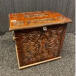 19th century Jacobean style hand carved coal chest. Fitted with cast iron handles to each side.