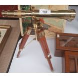 A Novelty Reproduction Brass Telescope on stand [35cm in height]