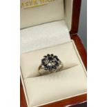 9ct yellow gold, sapphire and diamond cluster ladies ring. [Ring size K] [2.78Grams]