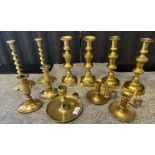 Large selection of Brass candlesticks includes Victorian candlesticks and vintage brass chamber