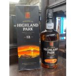 A Bottle of Kirkwall Highland Park 12 year old single malt whisky 70cl full & sealed with original