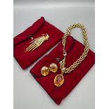 Pierre Lang- A Necklace gilt with bold links and a pendant drop; a pair of gilt metal mounted oval